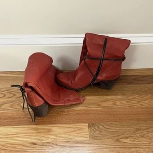 Tall orange boots from Brussels